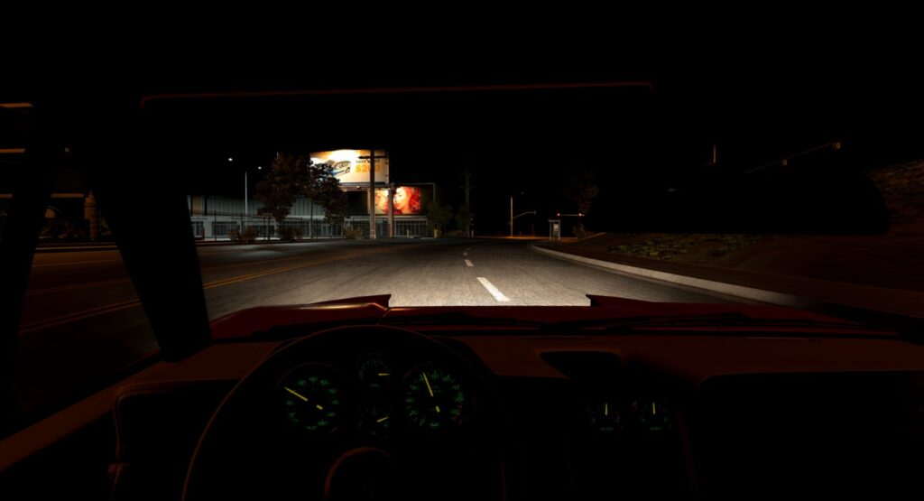 Vue depuis le cockpit de nuit dans BeamNG.drive v0.39 : les phares projettent un faisceau réaliste sur la route